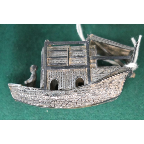 76 - Chinese silver miniature model of a junk, marked, 6cm, weight approx. 26g; also a further miniature ... 