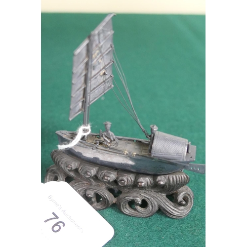 76 - Chinese silver miniature model of a junk, marked, 6cm, weight approx. 26g; also a further miniature ... 