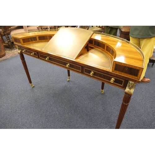 552 - William Tilman rosewood 'Regency' demi-lune writing table, having a brass galleried back fitted with... 