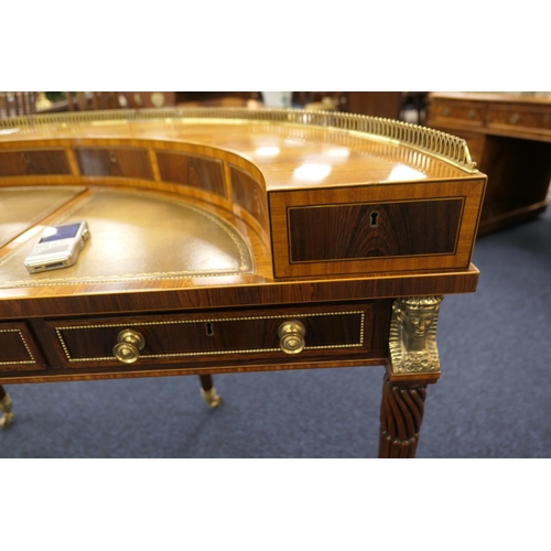 552 - William Tilman rosewood 'Regency' demi-lune writing table, having a brass galleried back fitted with... 