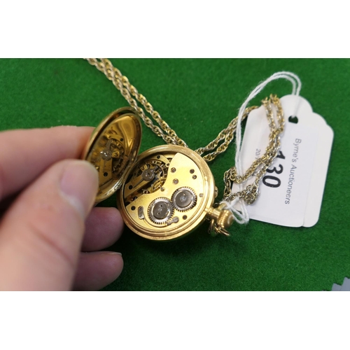 130 - 18ct gold crownwind half hunter lady's fob watch, the outer cover with blue enamelled Roman numerals... 