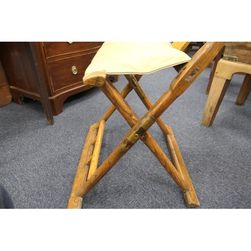 530 - Traditional Chinese elm cross frame folding chair, 19th Century, with replaced seat, height 99cm