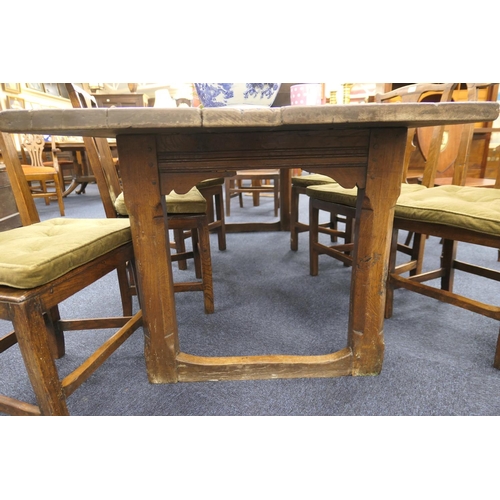 556 - Oak refectory table, Mid 17th Century and later, three plank top patinated and with some old graffit... 