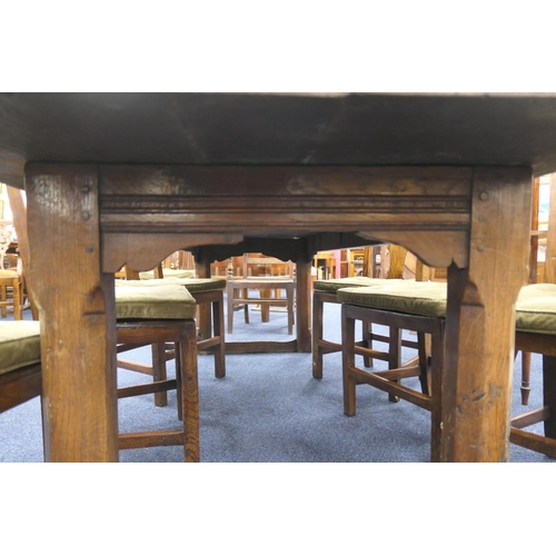 556 - Oak refectory table, Mid 17th Century and later, three plank top patinated and with some old graffit... 