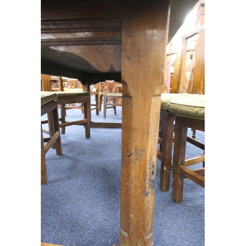 556 - Oak refectory table, Mid 17th Century and later, three plank top patinated and with some old graffit... 