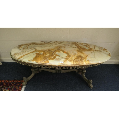 668 - Onyx and cast brass oval coffee table, length 125cm