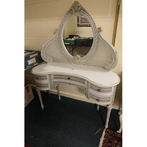 670 - French light grey painted parcel gilt caned mirror back kidney shaped dressing table, width 117cm, d... 