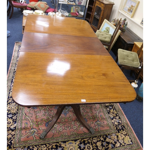 598 - Late Regency mahogany twin pedestal dining table, circa 1815-30, accommodating one additional leaf, ... 