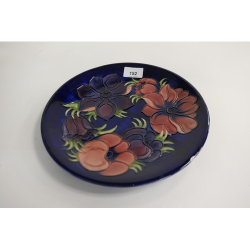 152 - Moorcroft anemone blue ground plate (second), 26cm diameter