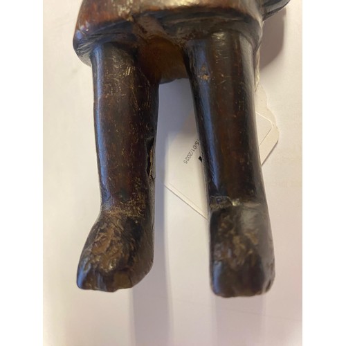 227 - Primitive carved wooden figure, probably 19th Century, 21cm