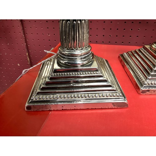 252 - Pair of Victorian silver Corinthian column dwarf candlesticks, Sheffield 1899, height 16cm (loaded)