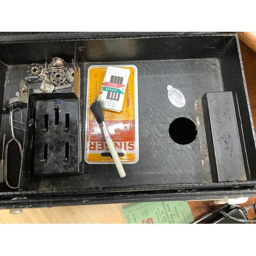 447 - Singer portable electric sewing machine, number 221K, with carrying case, foot pedal and instruction... 