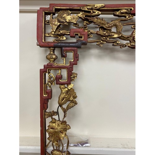 592 - Chinese carved and gilded door frame, carved throughout with dragons, bats, cranes, lotus flower and... 