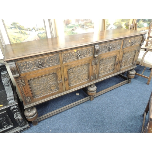 322 - Quality carved oak sideboard in the Tudor style, by Jaycee, width 187cm, depth 50cm, height 95cm