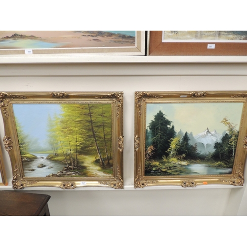 325 - Two gilt framed oil paintings of forest landscapes