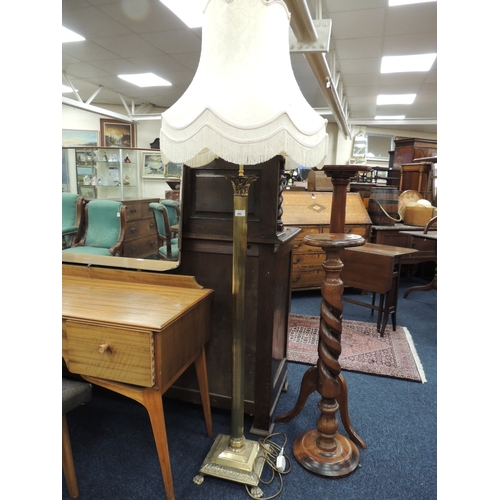 492 - Brass Corinthian column standard lamp with cream coloured frilled shade