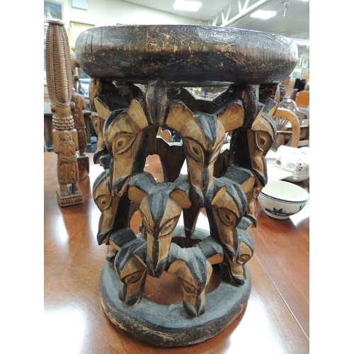 510 - African carved wooden stool, height 41cm