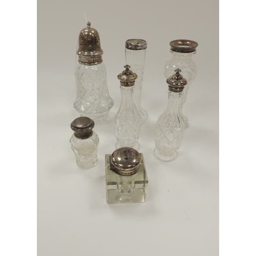 165 - Pair of silver mounted cut glass cruet bottles, Birmingham 1852, height 13.5cm, also a silver mounte... 