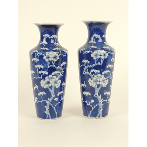 10 - Pair of Chinese blue and white prunus pattern vases, late 19th Century, tapered, shouldered cylinder... 