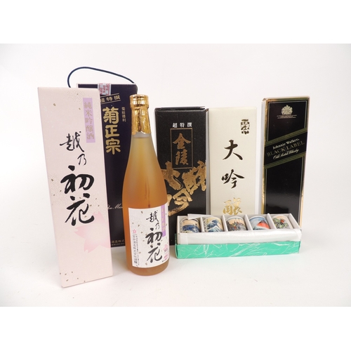 185 - Kiku Masamune, Sake (65cl); also three further bottles of Sake; boxed Japanese porcelain Sake cups a... 