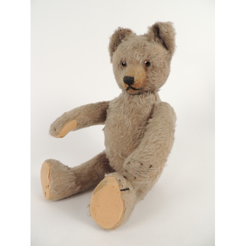 198 - Vintage plush teddy bear with swivel head and short tail, original glass eyes, 33cm