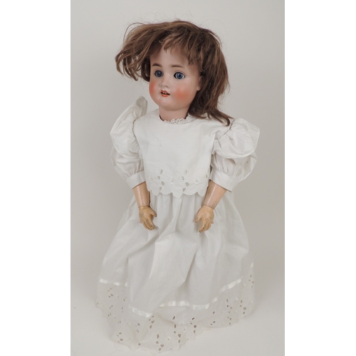 206 - Schoenau and Hoffmeister bisque headed doll, mould mark '1906/14', rolling glass eyes with painted l... 