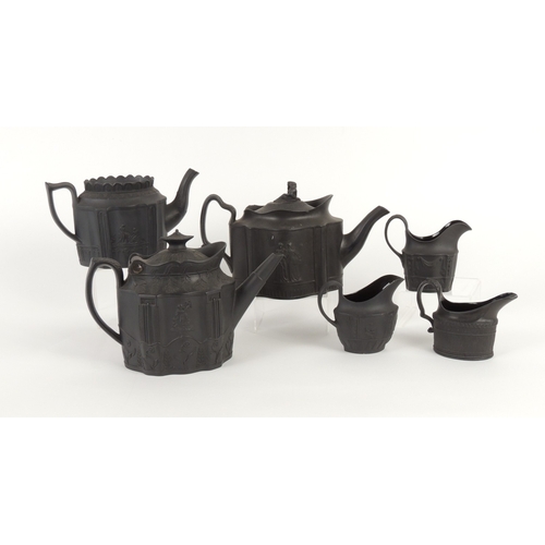 25 - Small selection of black basalt tea wares, including teapot in silver shape with hinged cover, circa... 