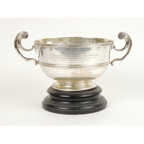 385 - Late Victorian silver presentation bowl, by Daniel and John Wellby, London 1898, twin handled form c... 