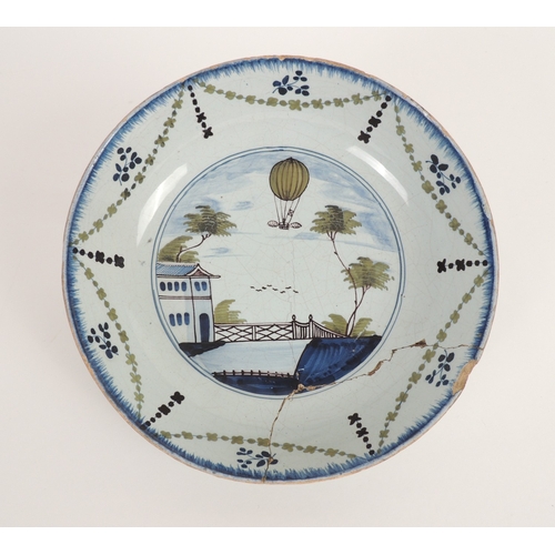 41 - London delft 'Lunardi' ballooning plate, Lambeth circa 1785, finished in blue, green and manganese (... 