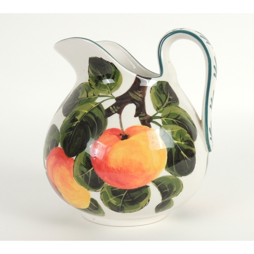 42 - Griselda Hill Pottery jug, decorated with apples, height 17cm