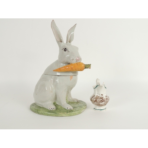 44 - Early Victorian printware milk jug 'Rabbits', height 11.5cm; also a decorative faience rabbit form c... 