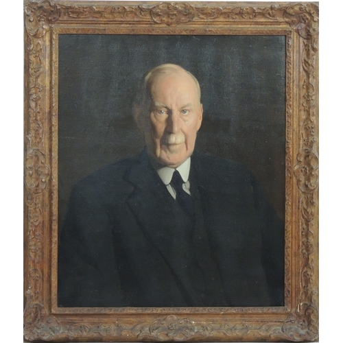 89 - Stanley Reed (1908-78), Portrait of a gentleman, half length in a black jacket, oil on canvas, signe... 