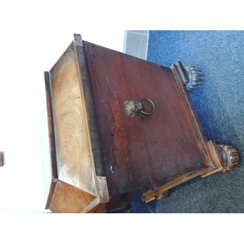 579 - William IV mahogany sarcophagus wine cooler, circa 1835, with lion's mask ring handles, turned feet ... 