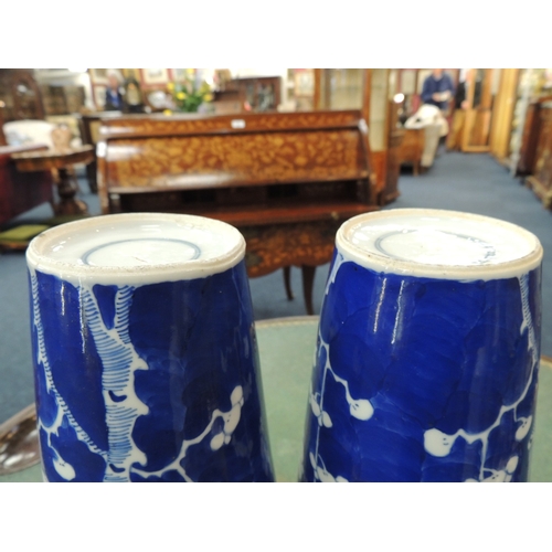 10 - Pair of Chinese blue and white prunus pattern vases, late 19th Century, tapered, shouldered cylinder... 