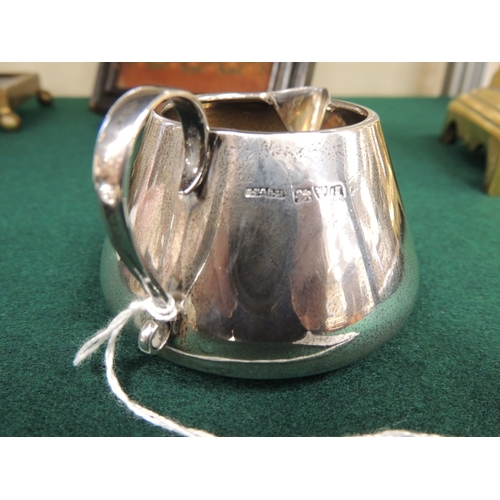 407 - George V silver cream jug, in the style of Dr. Christopher Dresser, Chester 1912, height 6cm, weight... 