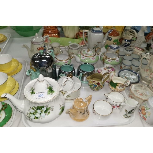 205 - A Royal Albert Trillium tea pot, a Noritake tea pot and two other matching pieces, Japanese and othe... 