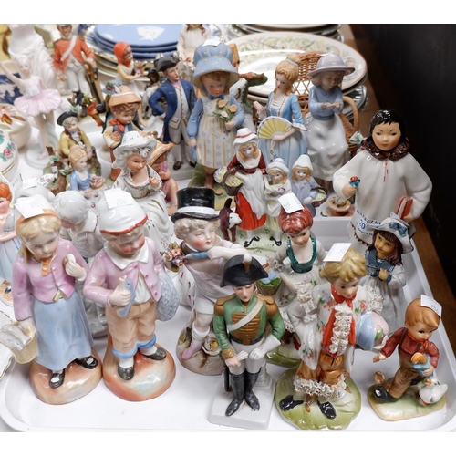 206 - A selection of Various bisque and ceramic figures, a girl marked 'Made in the USSR' and others