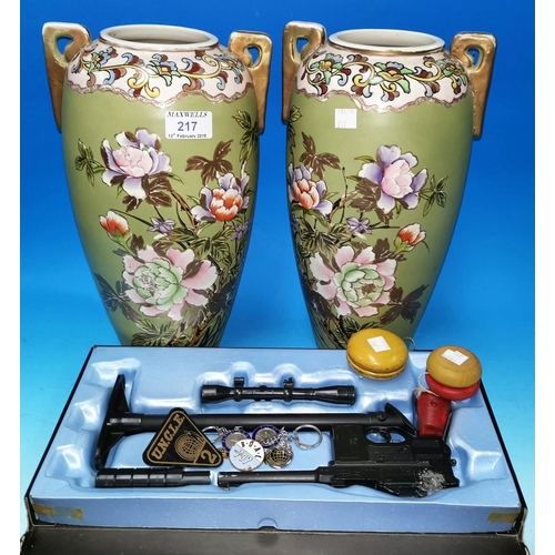 217 - A pair of 1930s Nippon Satsuma earthenware vases, 13