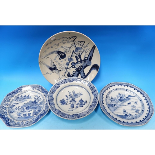 228 - A 19th century Chinese porcelain bowl decorated in blue white with central vase, 9