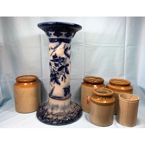 185 - A 19th century blue and white jardiniere stand; a stoneware pot and other storage jars
