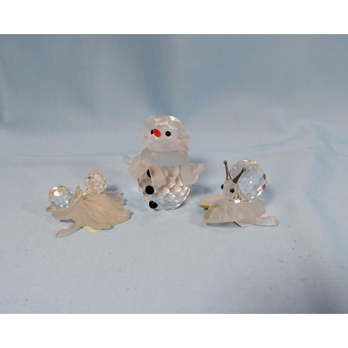 33 - 4 originally boxed Swarovski crystal Snowman A7475, Snail on leaf A7615, 2 snails on leaf A7550