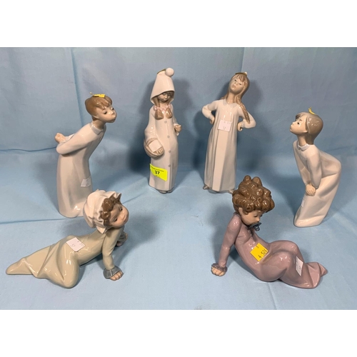 37 - 4 Lladro figures - children in night attire; 2 Lladro reclining baby figures