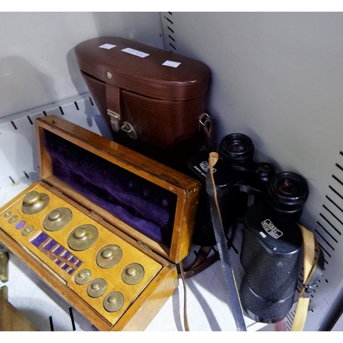 503 - A set of brass scientific weights in fitted mahogany box; a cased pair of Zeis binoculars