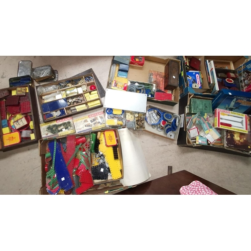 707 - A large collection of Meccano parts, including originally packeted Meccano Extra Parts, Super Tool s... 
