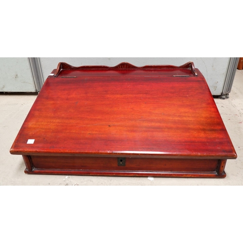 480A - A stained wooden sloped front table top writing desk with hinged lid