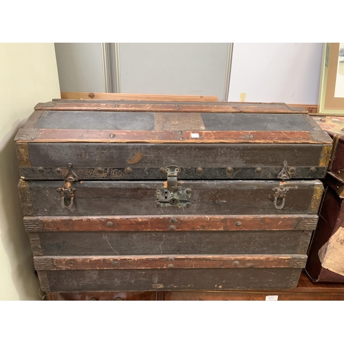614 - A 19th century  wood bound dome top cabin trunk