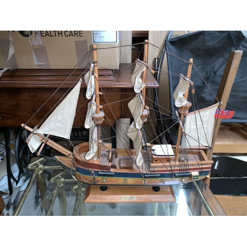 386 - A model of H M S Bounty with extensive decoration