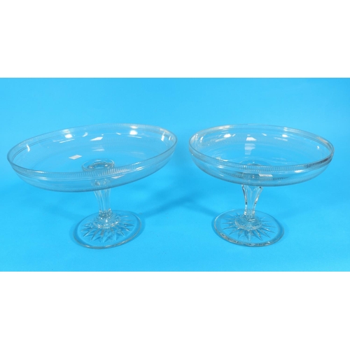 161 - A Victorian pair of graduated cut glass tazzas, engraved, 10.5
