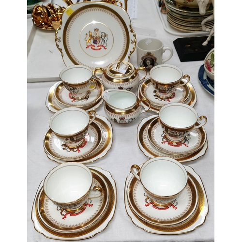 168 - A Windsor bone china 21 piece tea set commemorating the Coronation of H.M. Queen Elizabeth II, a sil... 