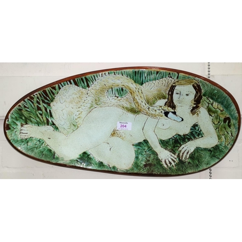 204 - A studio pottery terracotta plaque in oval form depicting Leda and the Swan in crackle glaze length ... 